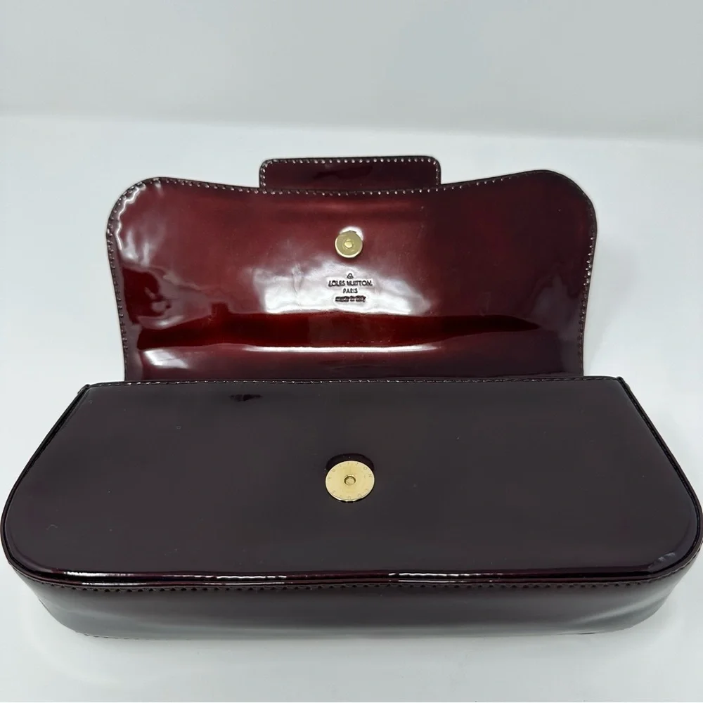 Louis Vuitton Dark Burgundy Clutch with Gold Logo